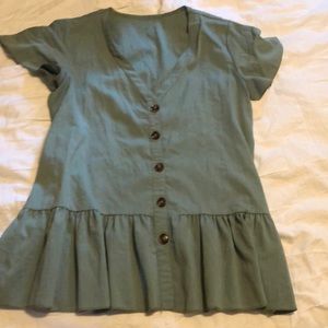 Drop hem top with button detail